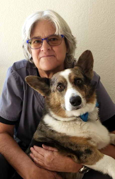 Image of Dr. Terry McQuade with dog