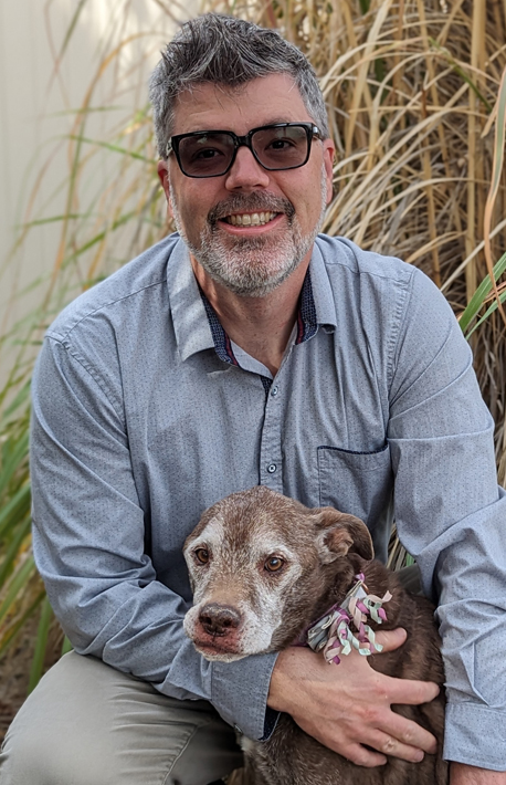 Image of Dr. Molinaro with dog